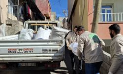 Umut Kervanı Mardin'de ihtiyaç sahibi ailelere odun ve soba yardımı yaptı